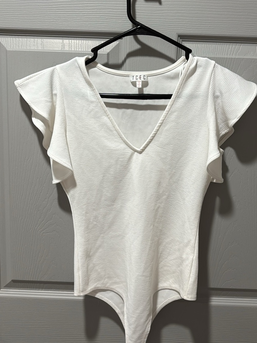 TCEC White Ribbed V-Neck Flutter Sleeve Bodysuit